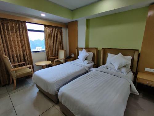 Hotel Pride Biznotel - The Maison Anand