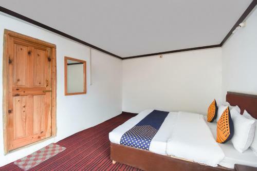 Spot On 63767 Hotel Swiss Cottage