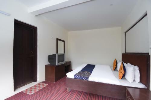 Spot On 63767 Hotel Swiss Cottage