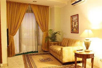 Hotel Travellers Suites Serviced Apartments
