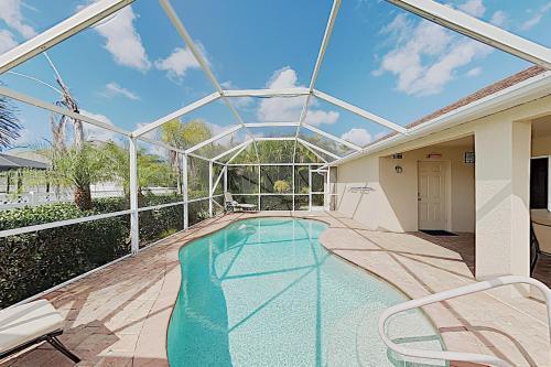 Charming Cape Coral Gem With Lanai & Pool Home