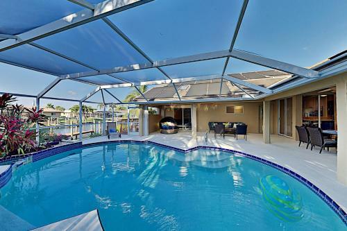 Canal-front Retreat With Boat Dock & Screened Pool Home