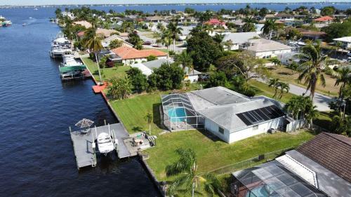 Canal-front Getaway With Heated Pool & Dock Home