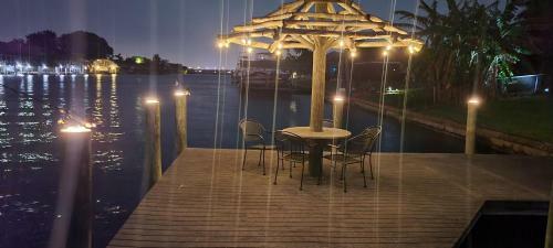 Canal-front Getaway With Heated Pool & Dock Home
