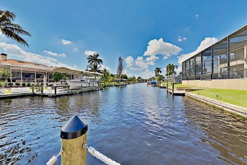 Chic Canal-front Home - Heated Pool, Private Dock Home