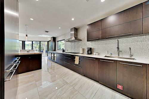 Exclusive Zen Oasis - Smart Pool & Private Beach Home
