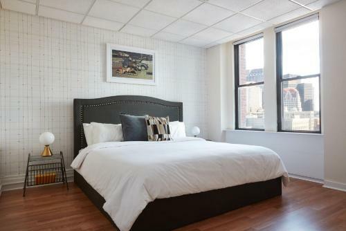 Evonify Stays - Theatre District Apartments