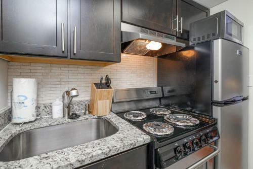 Evonify Stays - Theatre District Apartments