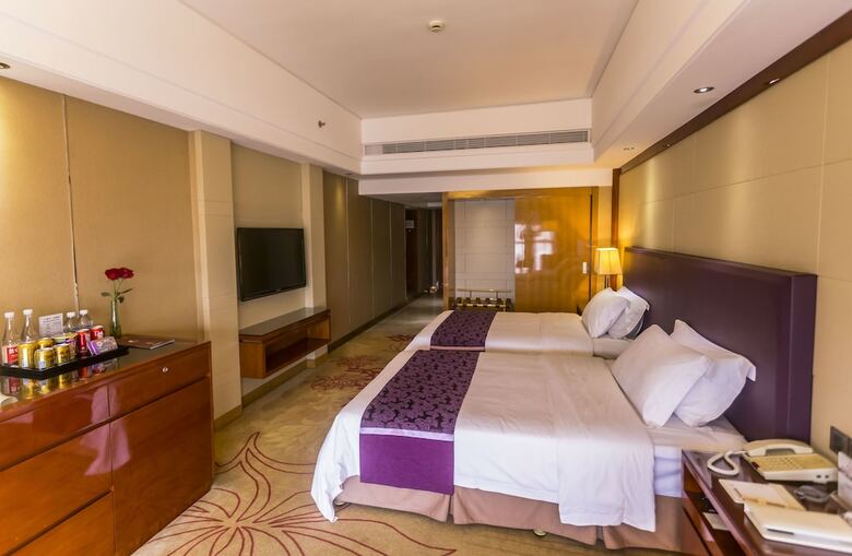 Manhattan Kinlen Hotel - Shishi