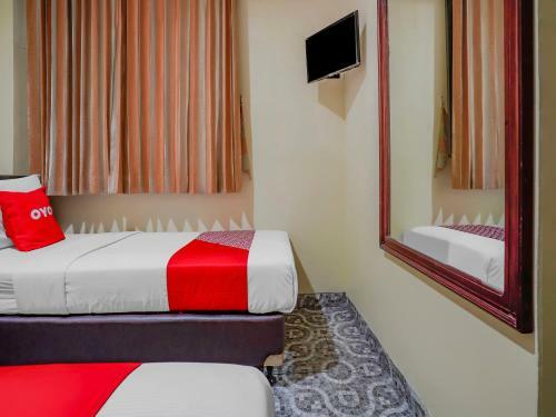 Oyo 90064 Hotel Salon Fora & Cafe