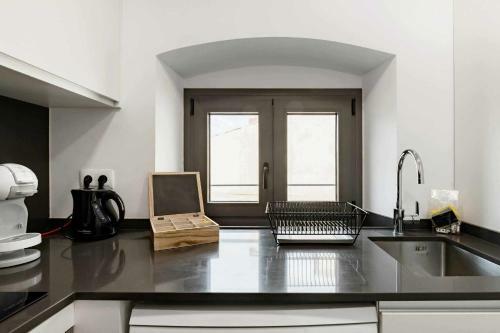 Revitalized Downtown Apartment In Historical Building