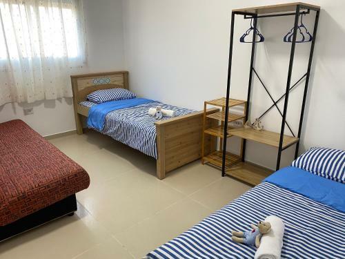 Acre New 3 Bedrooms Beachfront Apartment