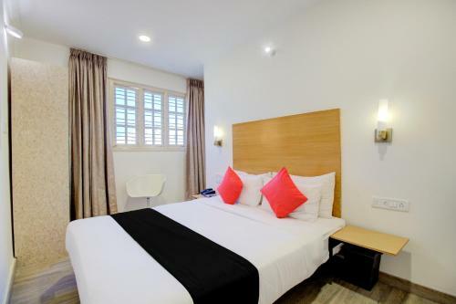 Capital O 77459 Smile Hotels