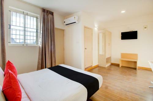 Capital O 77459 Smile Hotels