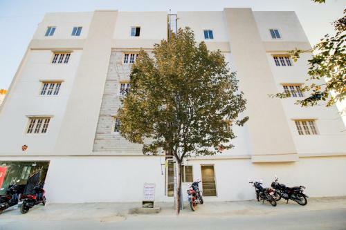 Capital O 77459 Smile Hotels