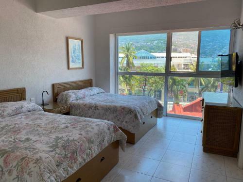 Beachfront Apartment In Acapulco, Ideal For Vacation Or Remote Working