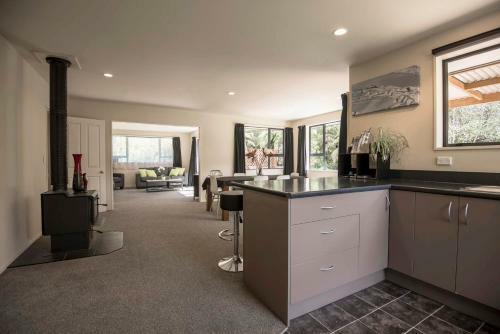 Apartamento Six Kamahi Guest House & Studio Unit