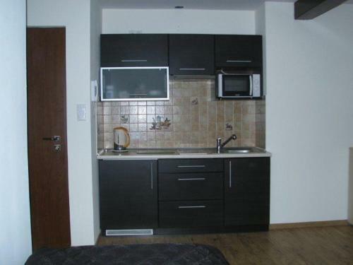 Apartamenty Pod R�?ami