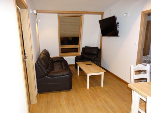 Apartamenty Pod R�?ami