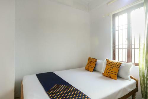 Hotel Spot On 49577 Thozhupaadan Residency