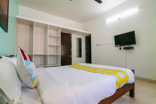 Hostal Oyo 79724 Tharayil Apartments