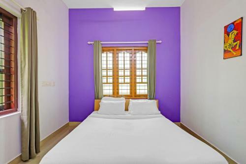 Hotel Capital O 84184 Pop Tavern Kazhakkottam