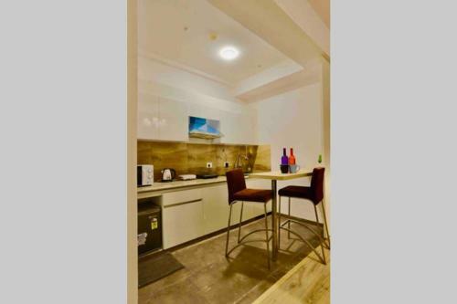Apartamento The F�ilte Square Near India Expo Mart