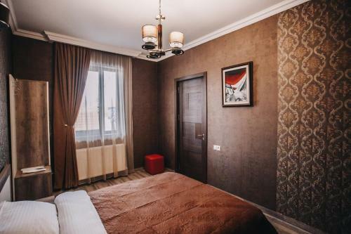 7 Rooms Hotel