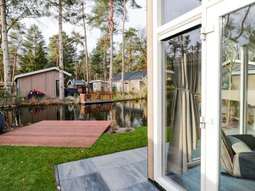 Modern Chalet With A Dishwasher, Located On A Pond