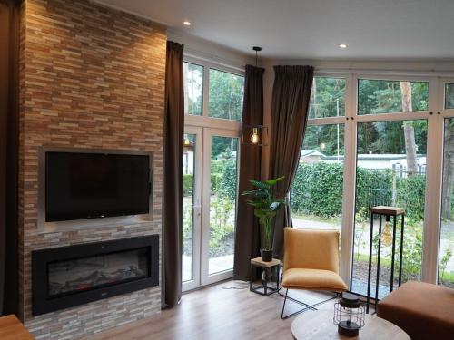 Spacious Chalet With Decorative Fireplace, Located On The Veluwe
