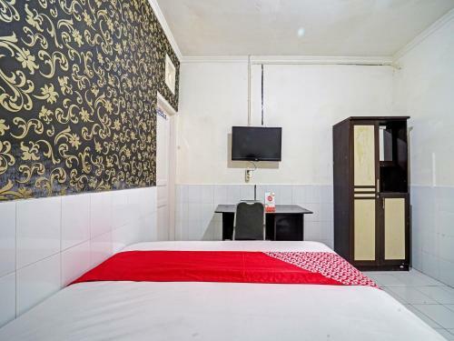 Hotel Oyo 90496 Izzi Ekslusif