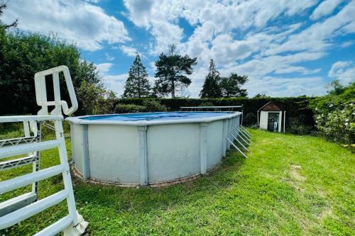 House In A Green Setting With Swimming Pool
