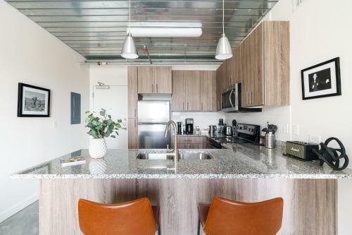 Apartamento Lodgeur At Mid Main Lofts