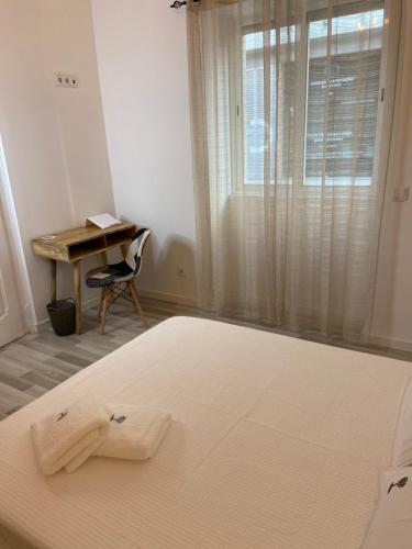 Casa Amendoeira Olh�o