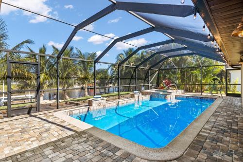 Direct Access Waterfront Villa With Heated Pool & Spa Edgewater Escape Roelens Vacations
