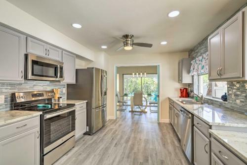 Tropical Waterfront Home Central Location!