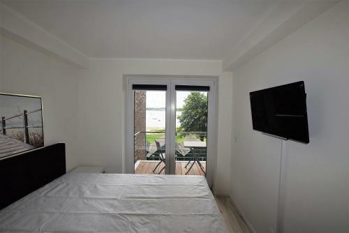 Apartamento Meeresblick-strandperle-haus-2-we-24