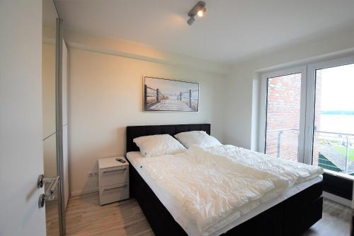 Apartamento Meeresblick-strandperle-haus-2-we-24