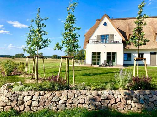 Apartamento Urlaub de Luxe Unter Reet Bach Ins