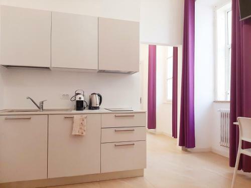 Hostal Trieste Center Rooms & Apartments