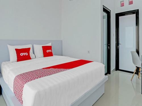 Hotel Oyo 90525 White Guesthouse