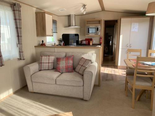 Woodpecker Lodge, Camelot Holiday Park, Ca6 5sz