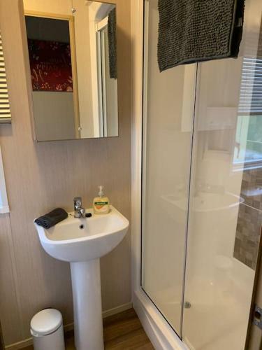 Woodpecker Lodge, Camelot Holiday Park, Ca6 5sz