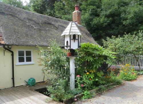 Apartamento Stream Cottage, 450 Year Old Thatched Cottage