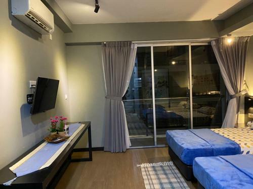 Apartamento Aeropod Rhy Homey Home Stay