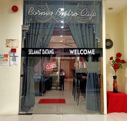 Oyo 90464 Borneo Suites Hotel