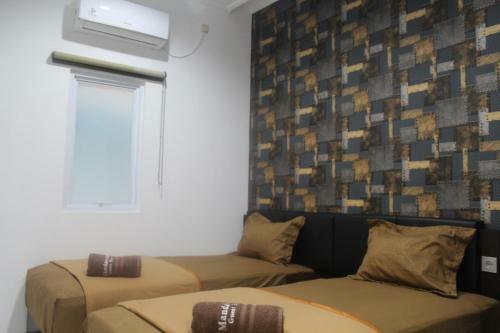 Hostal Mandastana Guest House And Kost