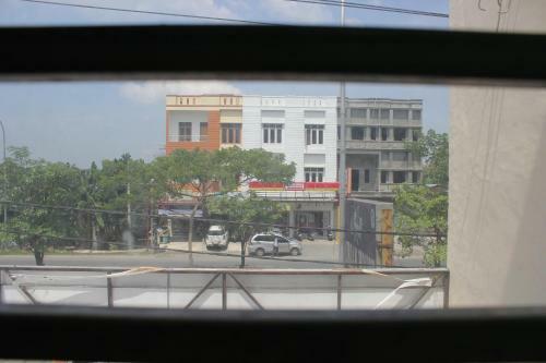 Hostal Penginapan Transit Tomato
