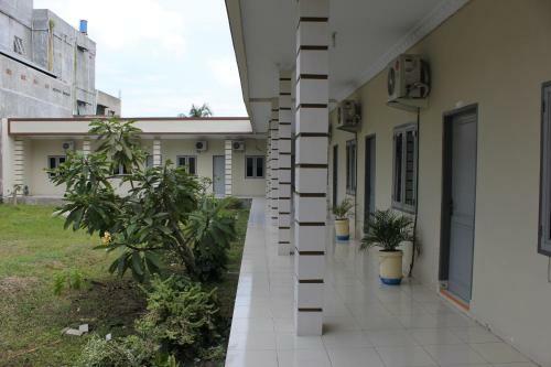 Hostal Penginapan Transit Tomato