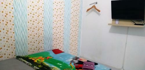 Studio Room At Apartment Aeropolis By Rusdi